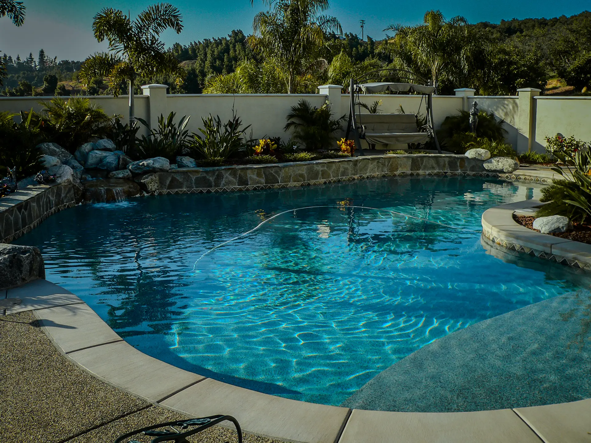 Luxury pool with waterfall and grotto features