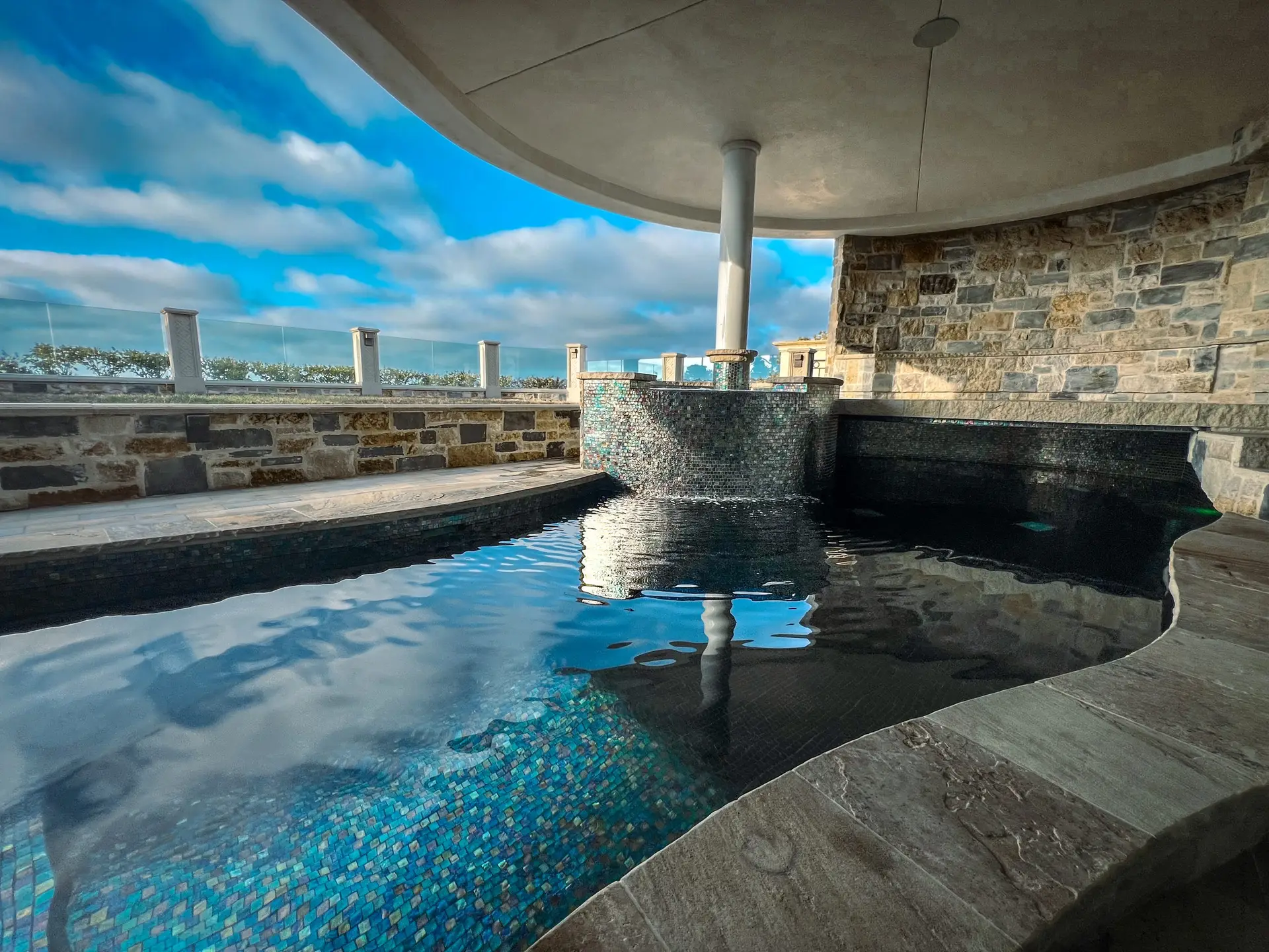Luxury pool and spa build in La Jolla with modern hardscaping